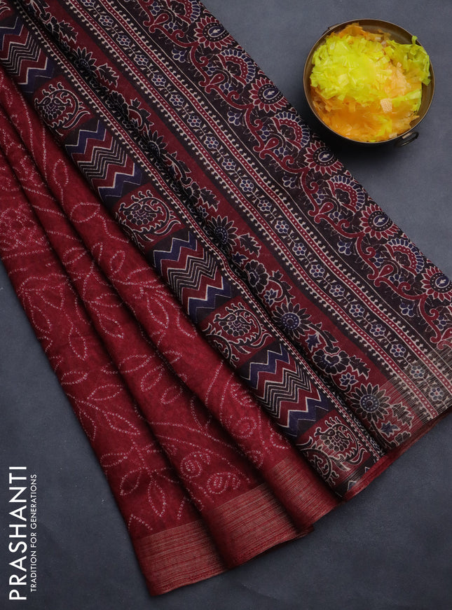 Semi linen saree maroon with allover bandhani prints and ajrakh printed pallu & blouse