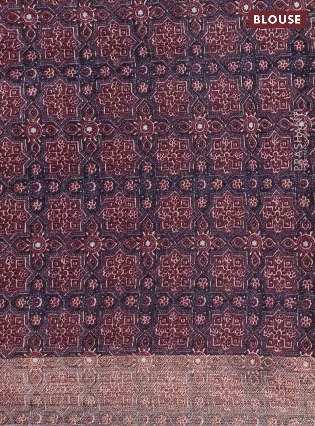 Semi linen saree maroon with allover bandhani prints and ajrakh printed pallu & blouse