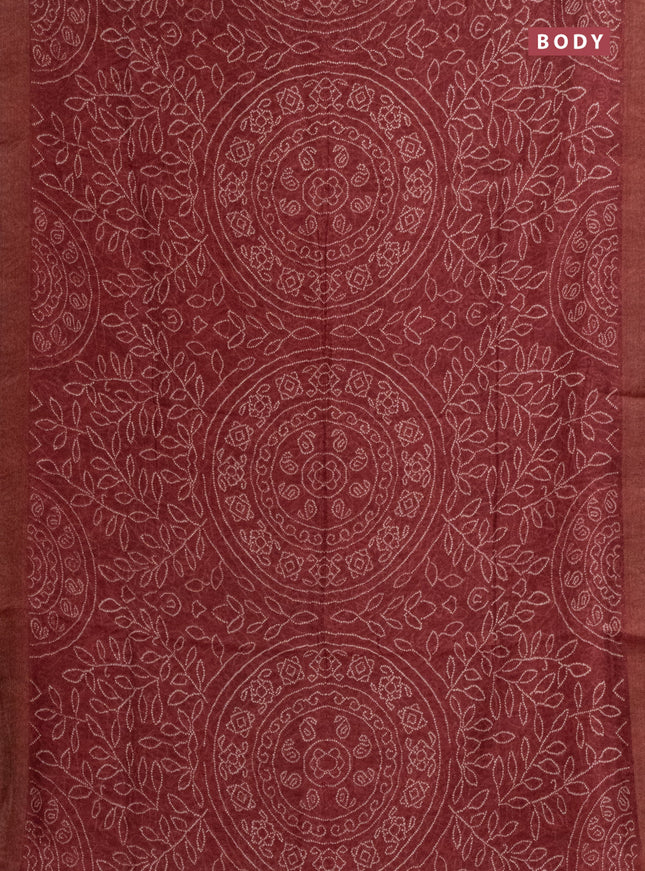 Semi linen saree maroon with allover bandhani prints and ajrakh printed pallu & blouse