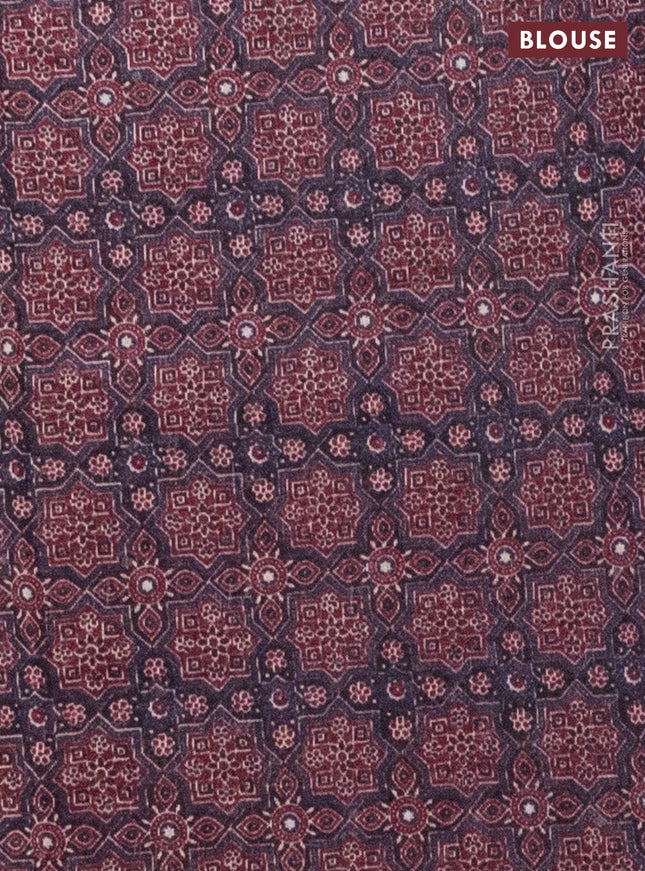 Semi linen saree maroon with allover bandhani prints and ajrakh printed pallu & blouse