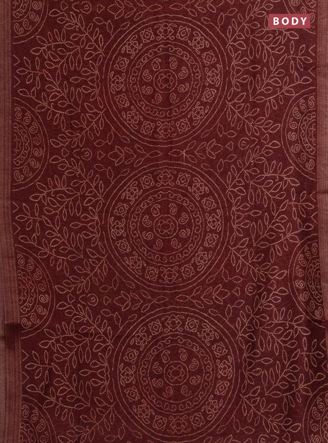 Semi linen saree maroon with allover bandhani prints and ajrakh printed pallu & blouse