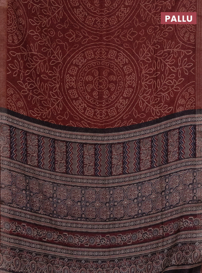 Semi linen saree maroon with allover bandhani prints and ajrakh printed pallu & blouse