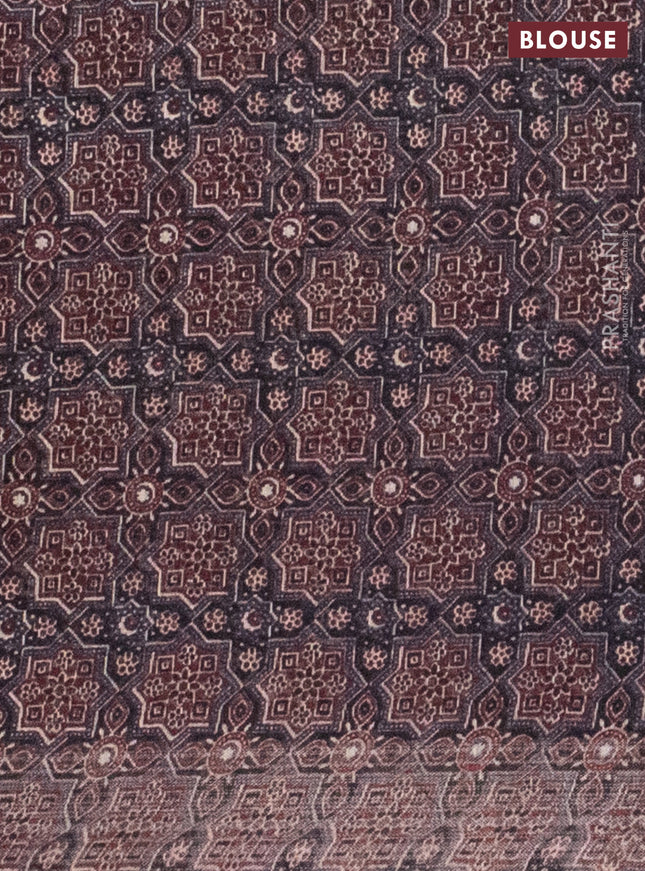 Semi linen saree maroon with allover bandhani prints and ajrakh printed pallu & blouse