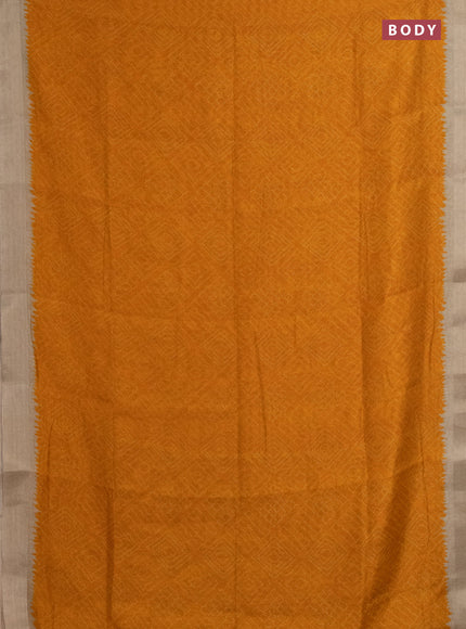 Semi linen saree mango yellow and beige with allover bandhani prints and kalamkari printed pallu & blouse