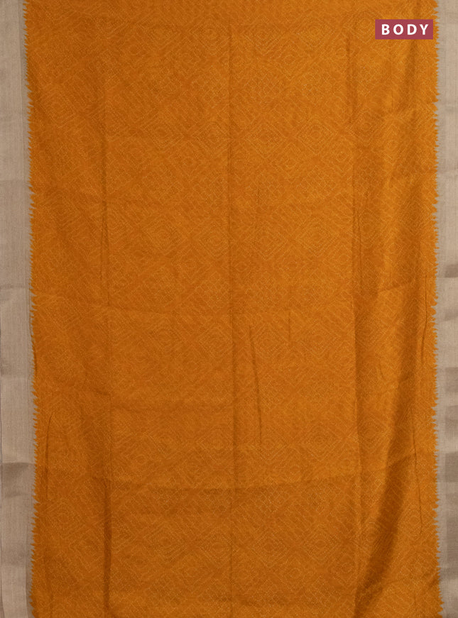 Semi linen saree mango yellow and beige with allover bandhani prints and kalamkari printed pallu & blouse