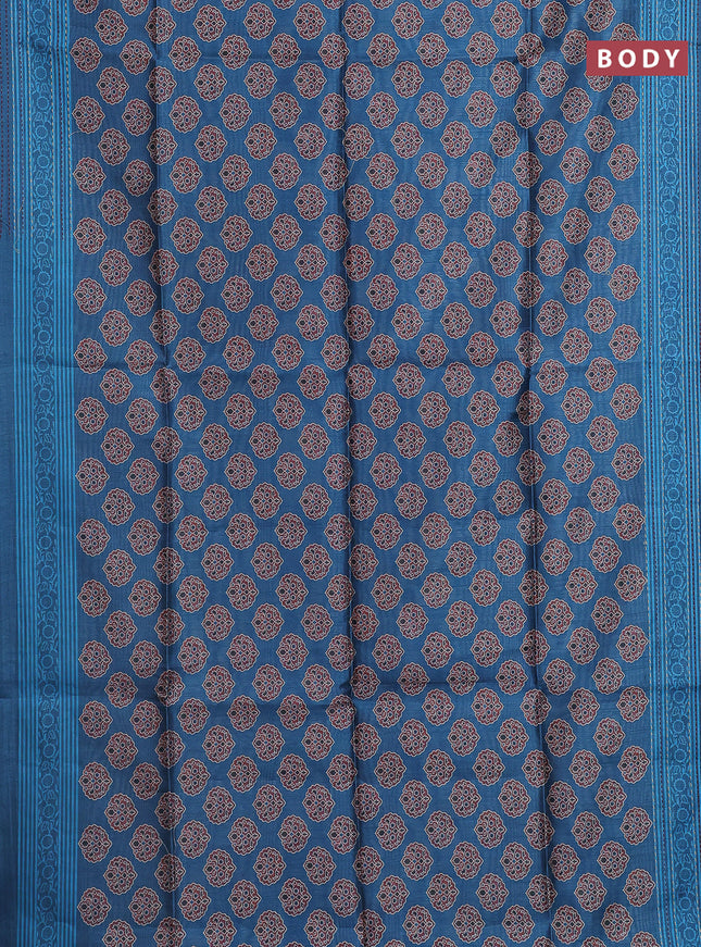 Semi tussar saree cs blue with allover ajrakh butta prints and katha stitch work pallu & border