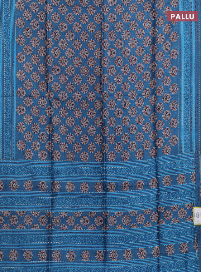 Semi tussar saree cs blue with allover ajrakh butta prints and katha stitch work pallu & border