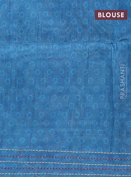Semi tussar saree cs blue with allover ajrakh butta prints and katha stitch work pallu & border