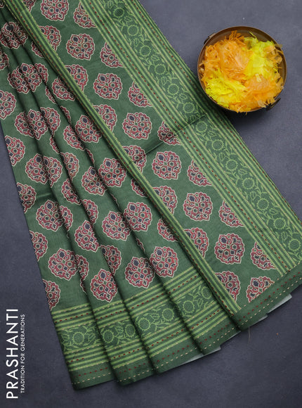 Semi tussar saree green with allover ajrakh butta prints and katha stitch work pallu & border