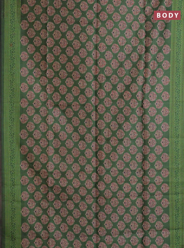 Semi tussar saree green with allover ajrakh butta prints and katha stitch work pallu & border