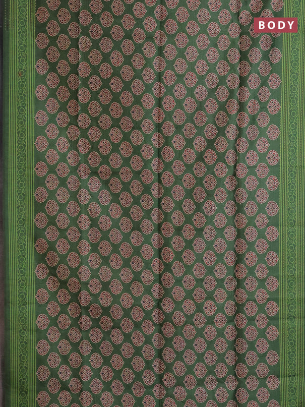 Semi tussar saree green with allover ajrakh butta prints and katha stitch work pallu & border