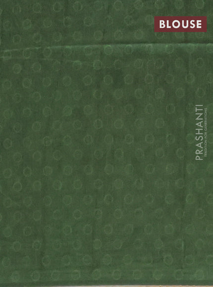 Semi tussar saree green with allover ajrakh butta prints and katha stitch work pallu & border