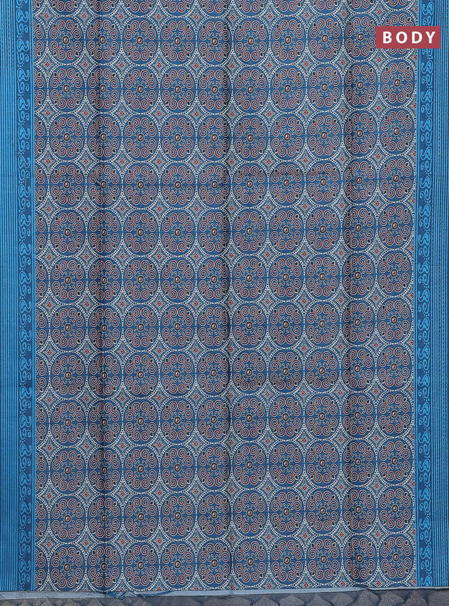 Semi tussar saree peacock blue with allover ajrakh prints and katha stitch work pallu & border