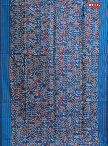 Semi tussar saree cs blue with allover ajrakh prints and katha stitch work pallu & border