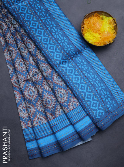 Semi tussar saree cs blue with allover prints and kantha stitch work border
