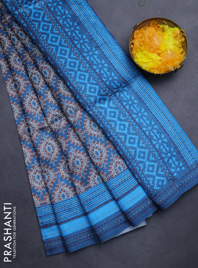 Semi tussar saree cs blue with allover prints and kantha stitch work border