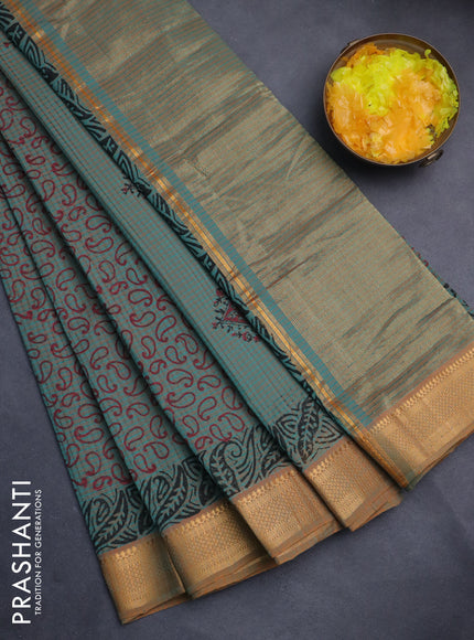 Mangalgiri cotton block printed saree dual shade of teal bluish mustard with allover prints and zari woven border