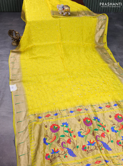 Dola silk bandhini saree yellow with allover bandhini prints and muniya butta border & Paithani pallu