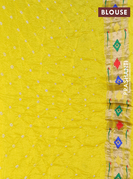 Dola silk bandhini saree yellow with allover bandhini prints and muniya butta border & Paithani pallu