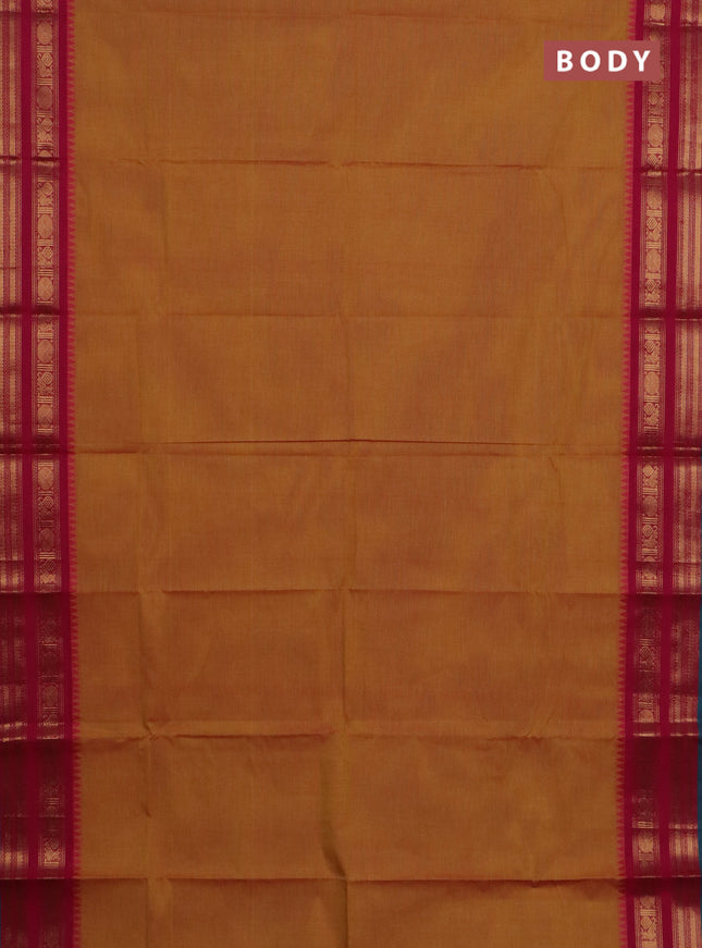 Chettinad cotton saree dual shade of mustard yellow and dual shade of teal green with plain body and zari woven border