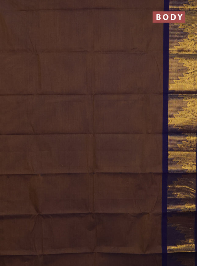 Chettinad cotton saree dual shade of dark mustard and navy blue with thread woven buttas and temple design zari woven border