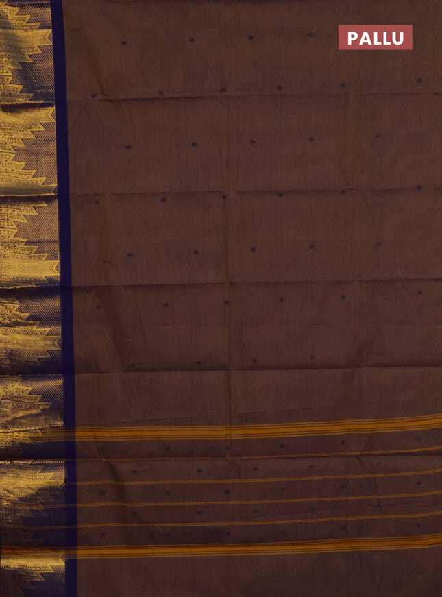 Chettinad cotton saree dual shade of dark mustard and navy blue with thread woven buttas and temple design zari woven border