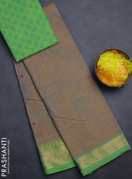 Chettinad cotton saree dual shade of bluish mustard and green with allover checks & buttas and zari woven muniya style border