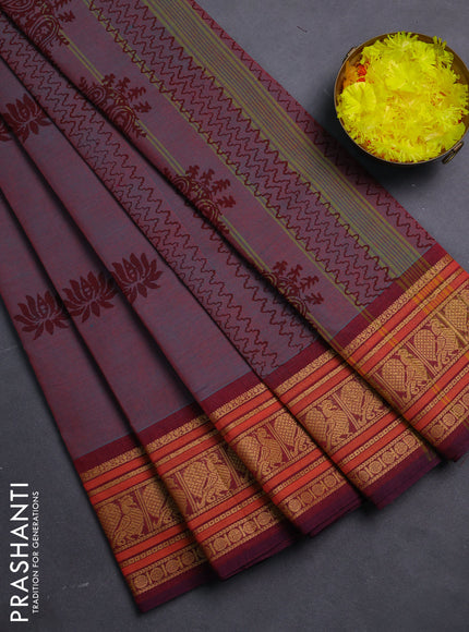 Chettinad cotton saree dual shade of bluish maroon and maroon with floral butta prints and thread woven border