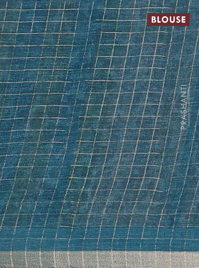 Linen cotton saree cream and peacock blue with allover prints & zari checks and zari woven border