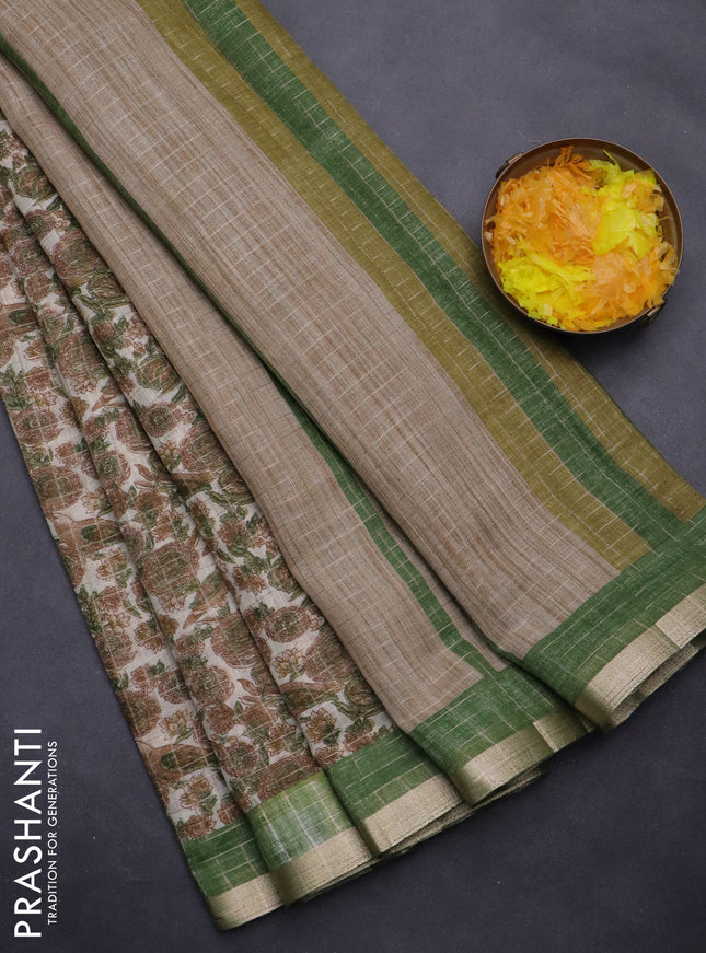 Linen cotton saree cream and green with allover prints & zari checks and zari woven border