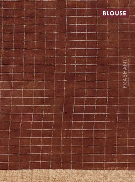 Linen cotton saree brown shade with allover floral prints & zari checks and zari woven border
