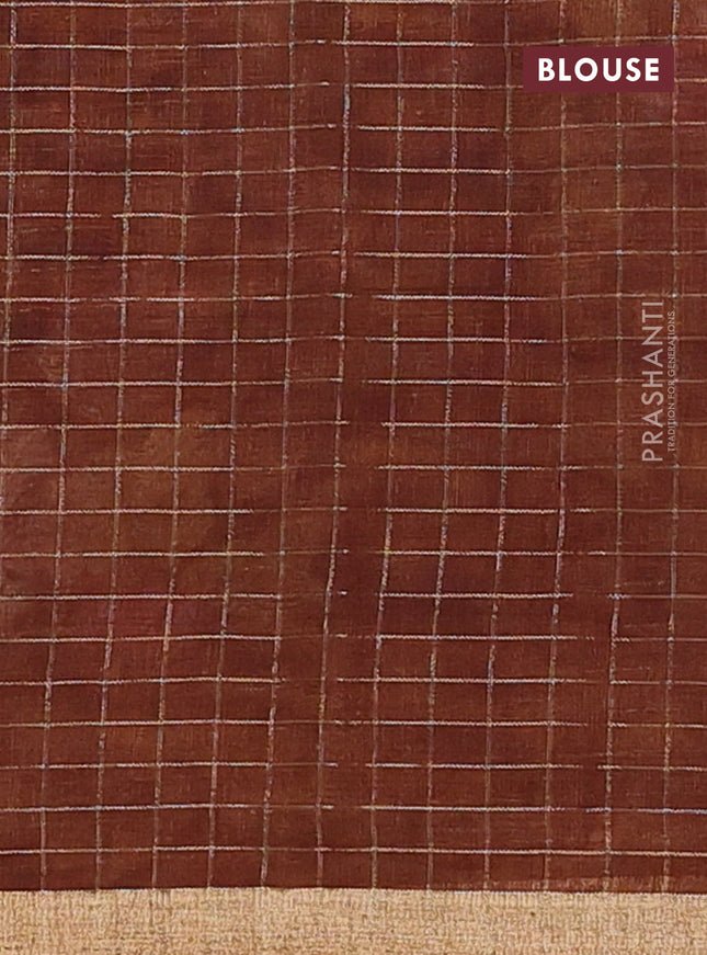 Linen cotton saree brown shade with allover floral prints & zari checks and zari woven border