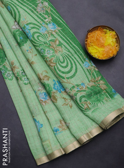 Linen cotton saree pista green with allover floral prints & zari checks and zari woven border