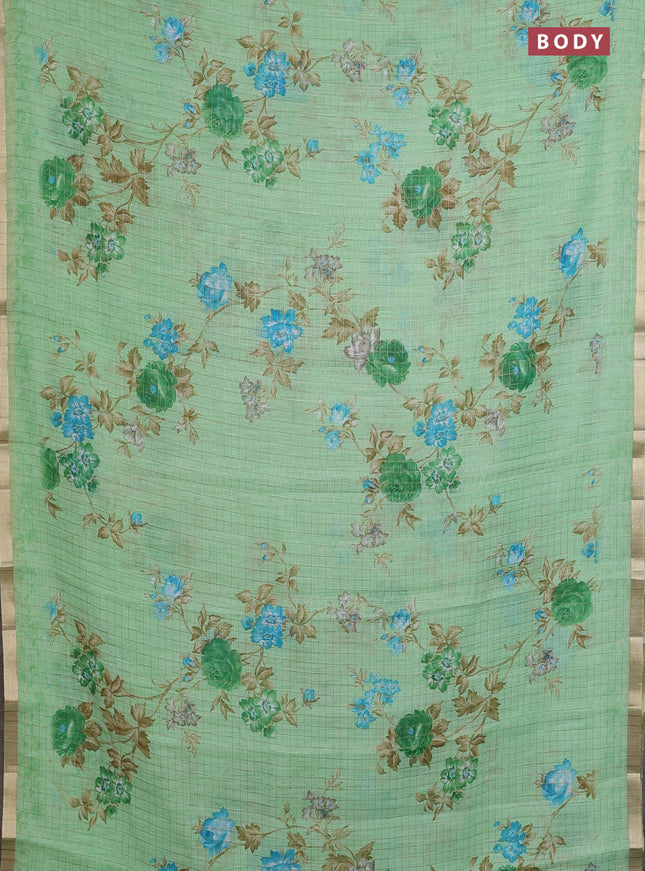 Linen cotton saree pista green with allover floral prints & zari checks and zari woven border