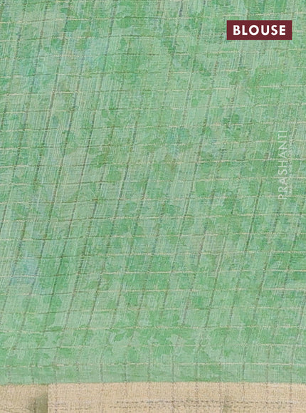 Linen cotton saree pista green with allover floral prints & zari checks and zari woven border