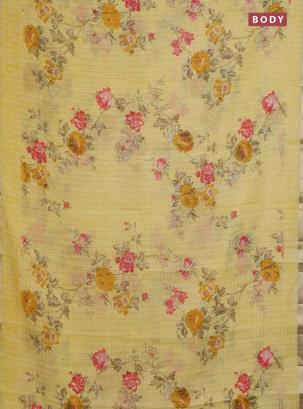 Linen cotton saree yellow with allover floral prints & zari checks and zari woven border