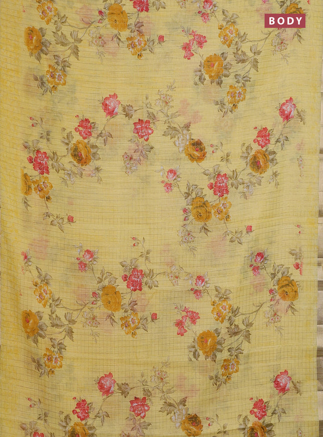Linen cotton saree yellow with allover floral prints & zari checks and zari woven border