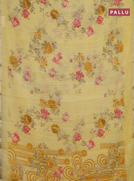 Linen cotton saree yellow with allover floral prints & zari checks and zari woven border