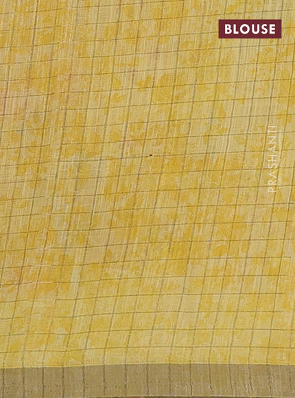 Linen cotton saree yellow with allover floral prints & zari checks and zari woven border
