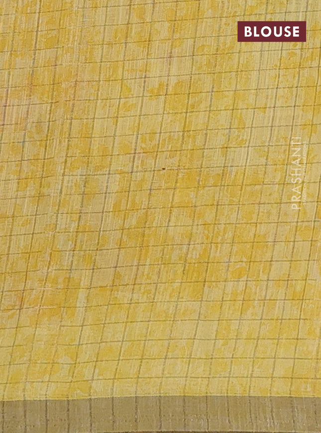 Linen cotton saree yellow with allover floral prints & zari checks and zari woven border