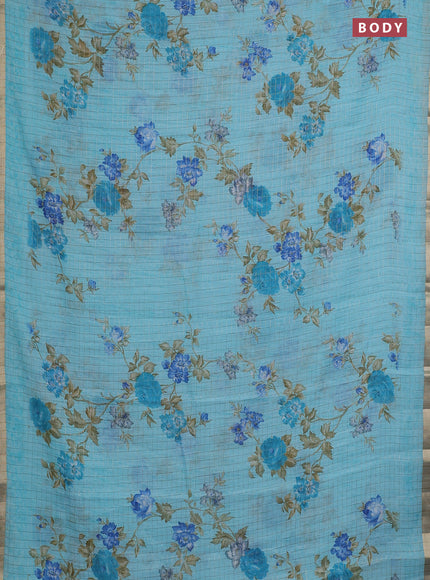 Linen cotton saree light blue with allover floral prints & zari checks and zari woven border