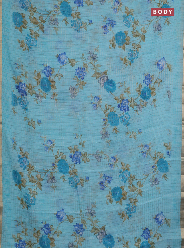 Linen cotton saree light blue with allover floral prints & zari checks and zari woven border
