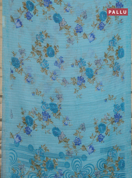 Linen cotton saree light blue with allover floral prints & zari checks and zari woven border