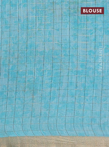 Linen cotton saree light blue with allover floral prints & zari checks and zari woven border