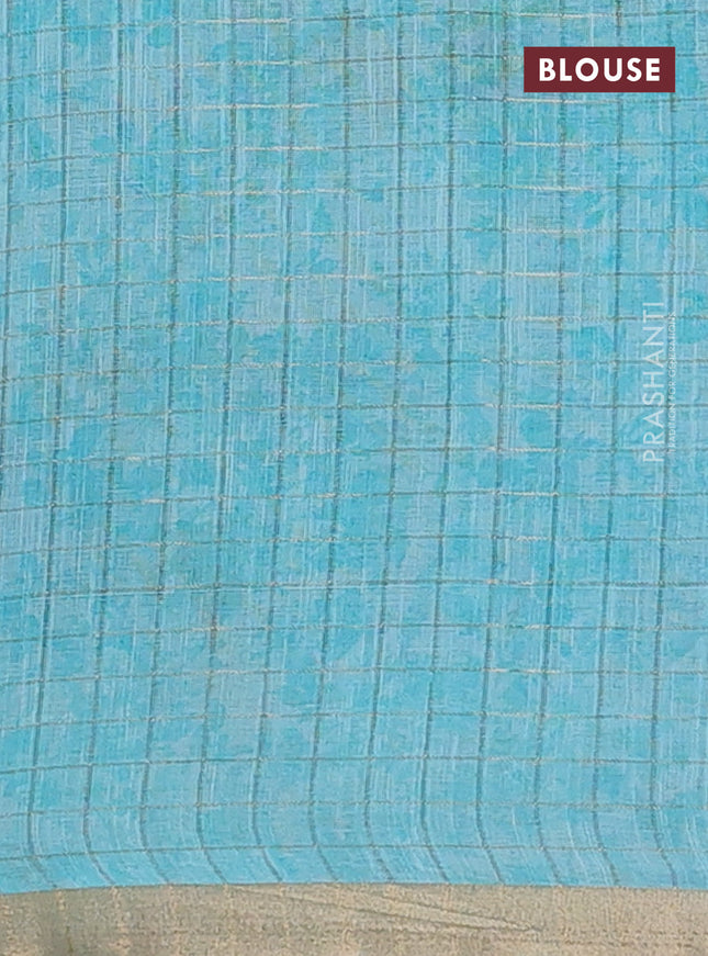 Linen cotton saree light blue with allover floral prints & zari checks and zari woven border
