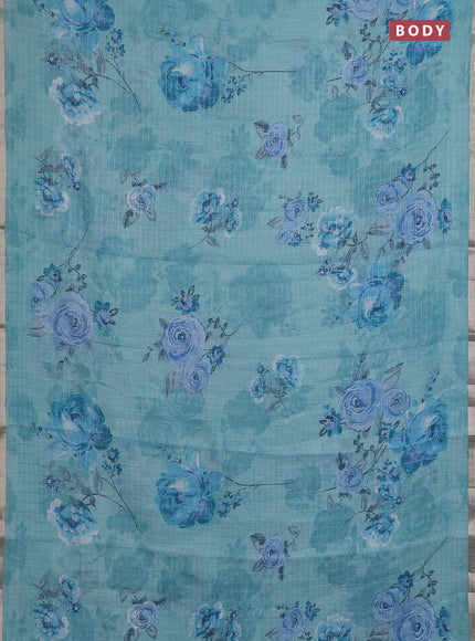 Linen cotton saree teal blue with allover floral prints & zari checks and zari woven border