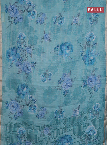 Linen cotton saree teal blue with allover floral prints & zari checks and zari woven border
