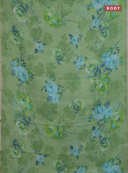 Linen cotton saree light green with allover floral prints & zari checks and zari woven border