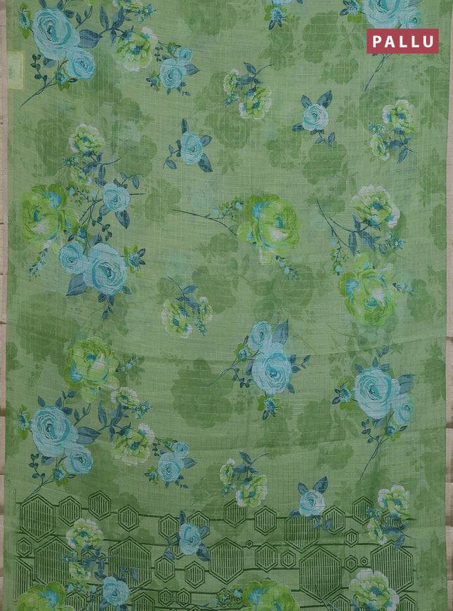 Linen cotton saree light green with allover floral prints & zari checks and zari woven border