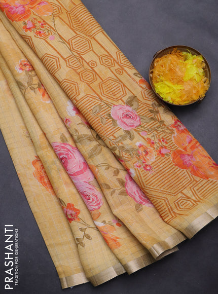 Linen cotton saree yellow with allover floral prints & zari checks and zari woven border